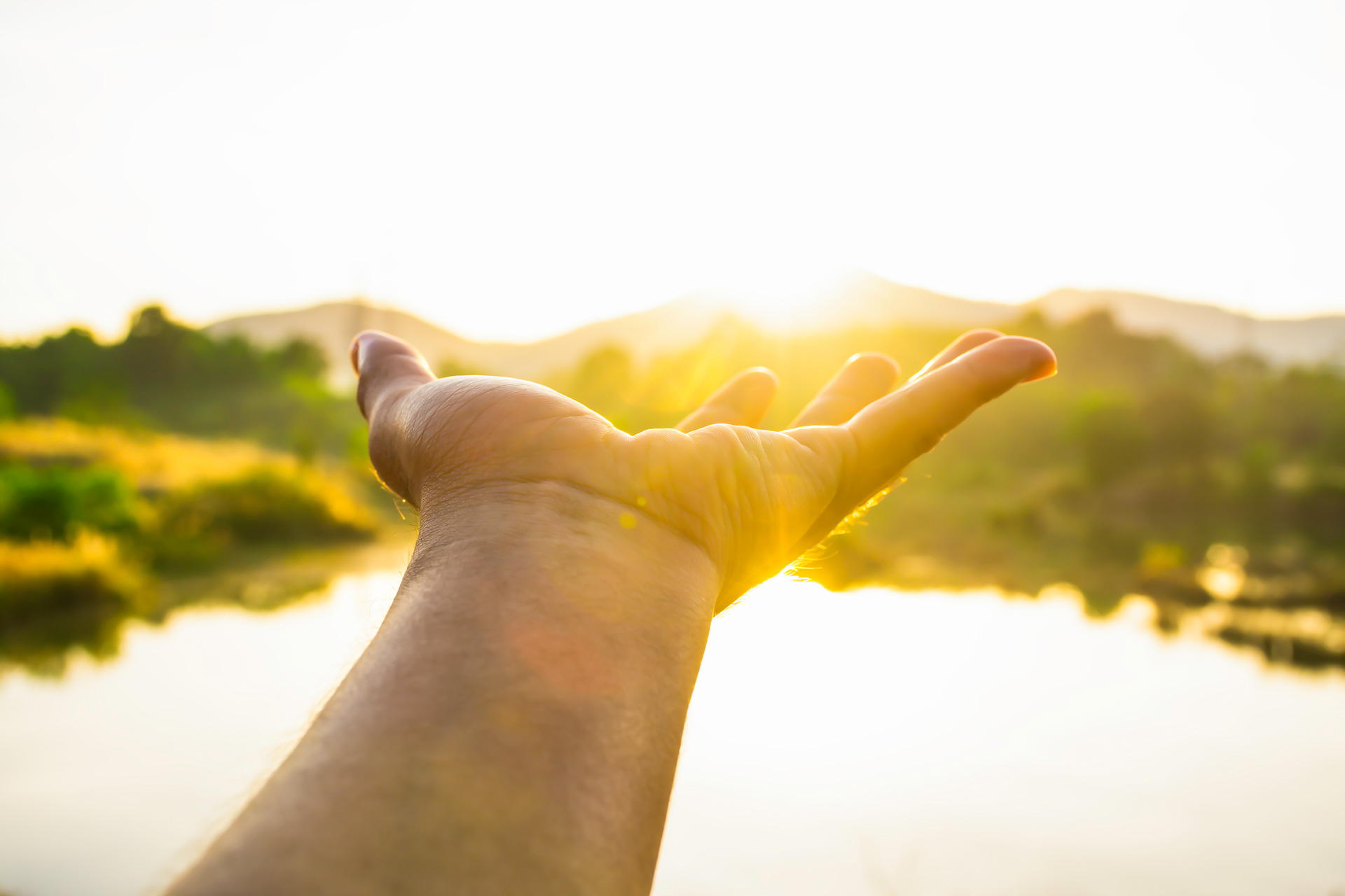use-hand-touch-sun-light-morning-pick-up-sun-by-hand